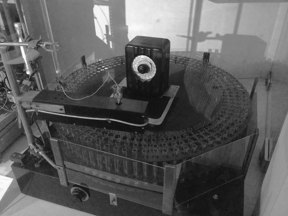Original rotating fraction collector used by Moore and Stein for analysis of RNAse. RU historic instrument collection, accession number 105.